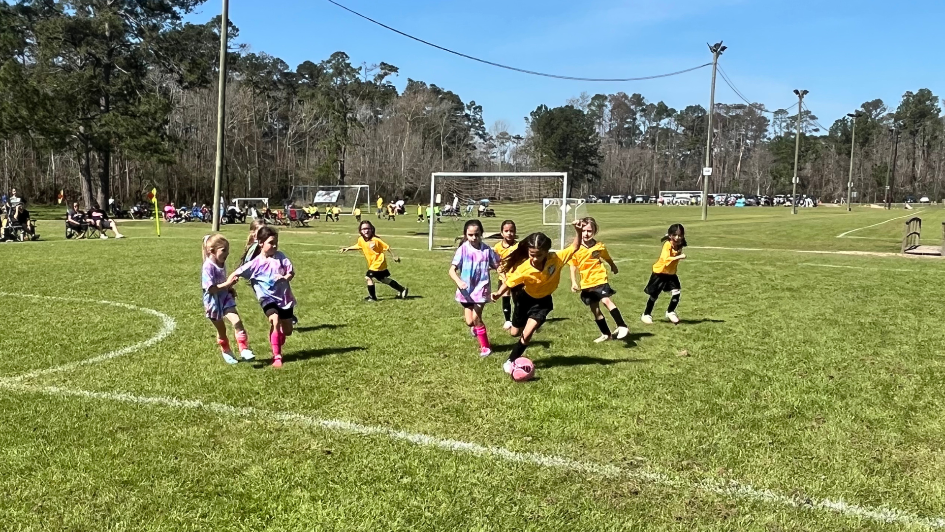 small kids playing soccer